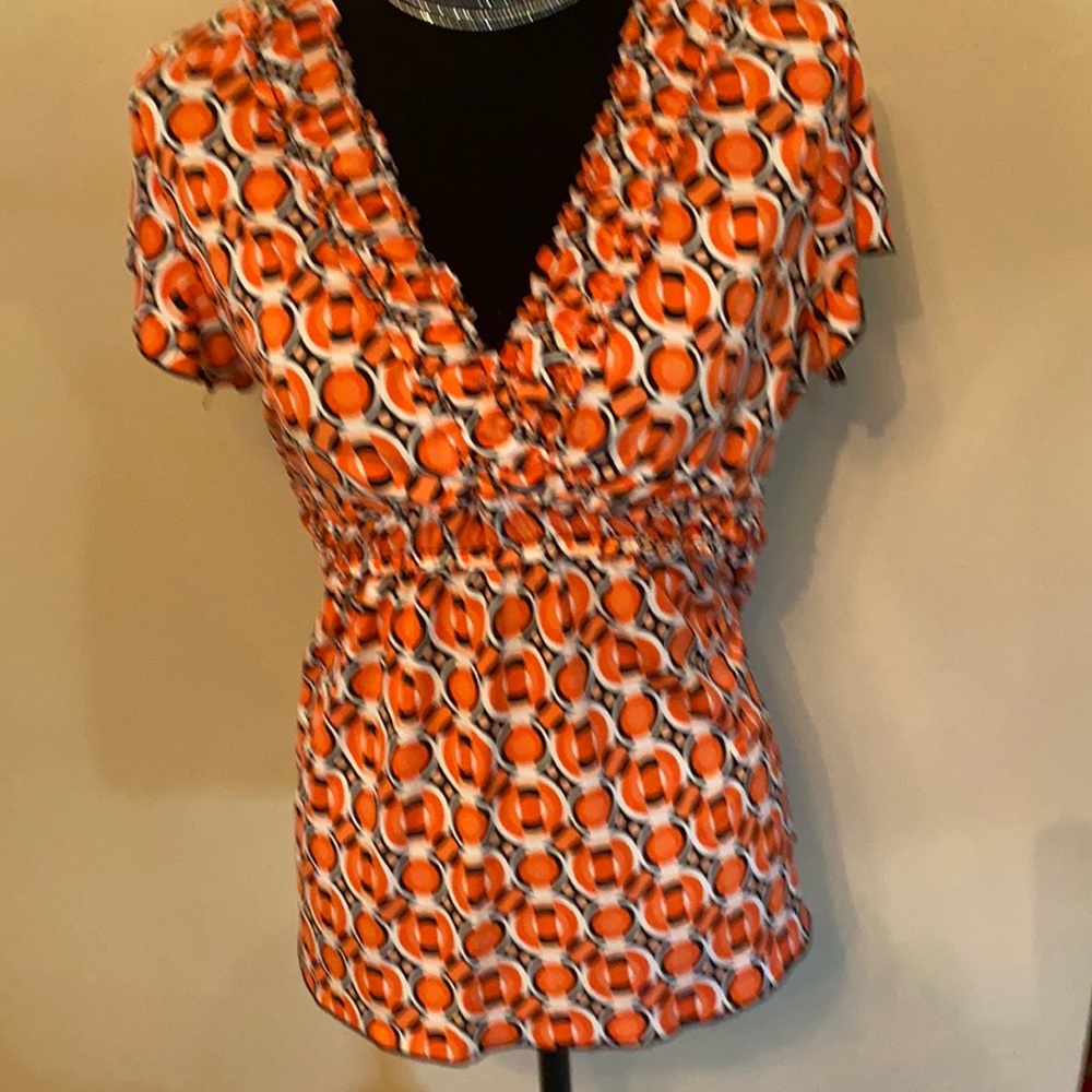 Susan Lawerence orange print top